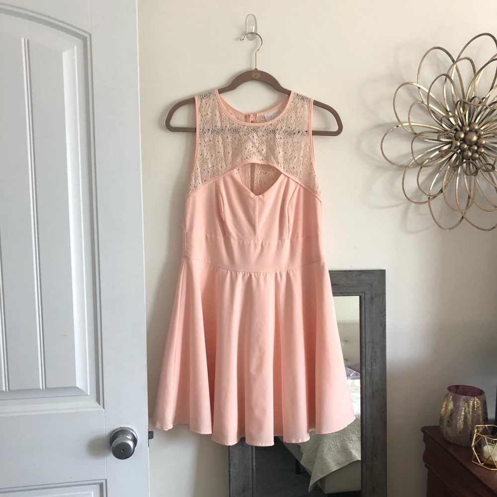 Soft pink dress with lace cutout neckline